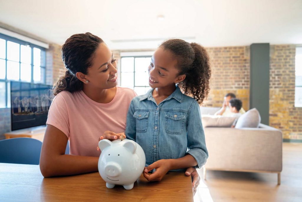 mother-and-child-with-piggy-bank